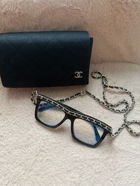 CHANEL Black Square Sunglasses with Gold Chain Accent